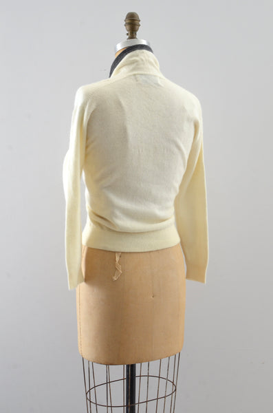 reserved… 50's Light Cream Sweater