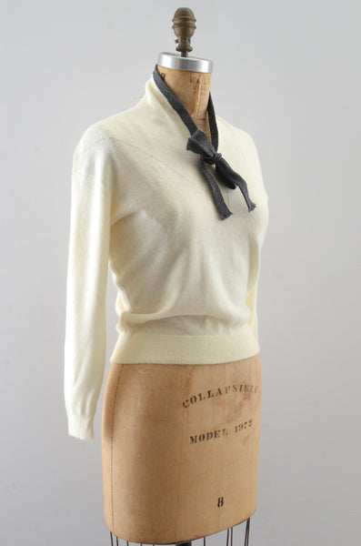 reserved… 50's Light Cream Sweater